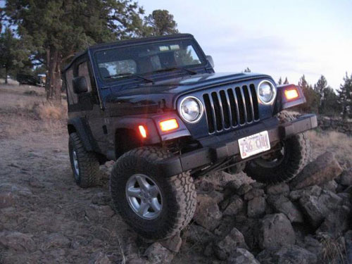 Lifted Jeep on rocks